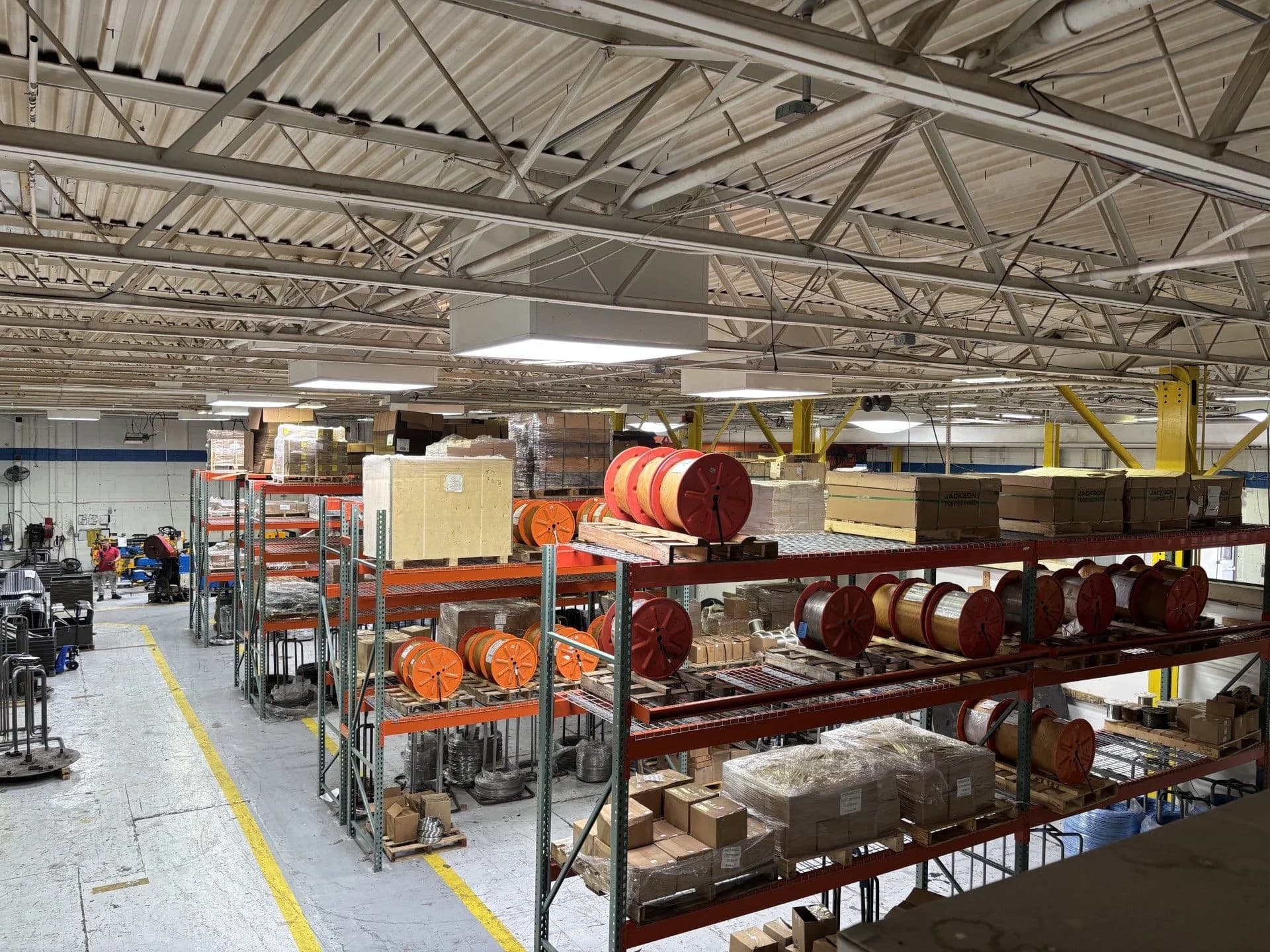 Wire coils in the American Wire Works warehouse